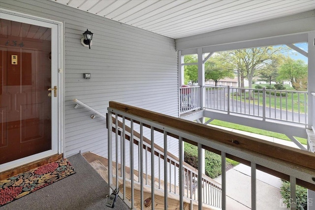 doorway to property featuring covered porch