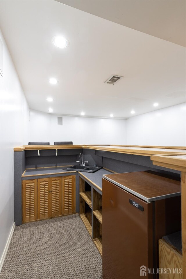 20 S So 8th Ave, Manville, NJ 08835 - kitchen with carpet flooring, recessed lighting, baseboards, open shelves, and a sink