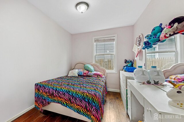 20 S So 8th Ave, Manville, NJ 08835 - bedroom with baseboards and wood finished floors