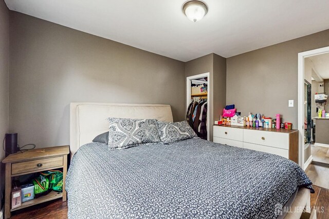 20 S So 8th Ave, Manville, NJ 08835 - bedroom featuring wood finished floors and a closet