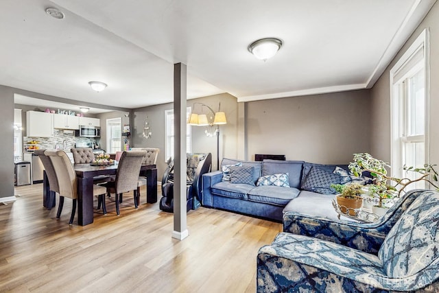 20 S So 8th Ave, Manville, NJ 08835 - living room featuring light wood-style flooring