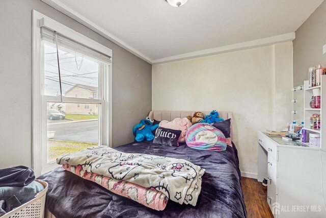 20 S So 8th Ave, Manville, NJ 08835 - bedroom featuring multiple windows and wood finished floors