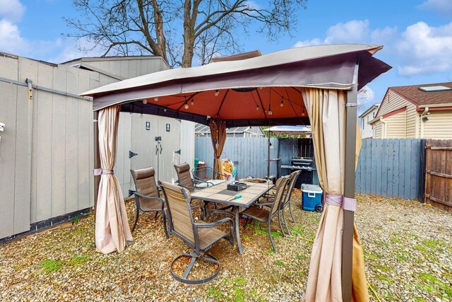 20 S So 8th Ave, Manville, NJ 08835 - fenced backyard with a gazebo and outdoor dining space