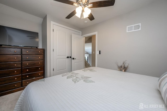 bedroom featuring visible vents and ceiling fan
