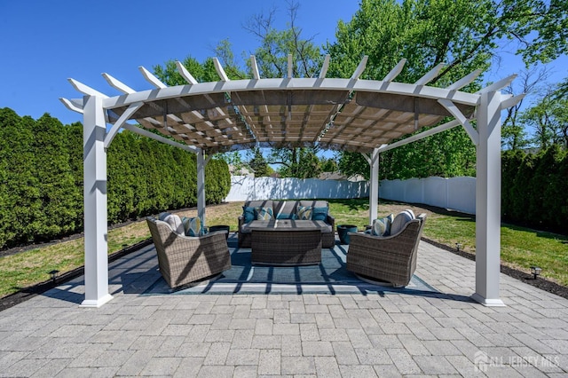 view of patio / terrace with a pergola, an outdoor hangout area, and a fenced backyard