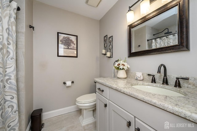 full bath featuring tile patterned flooring, vanity, toilet, a shower with shower curtain, and baseboards