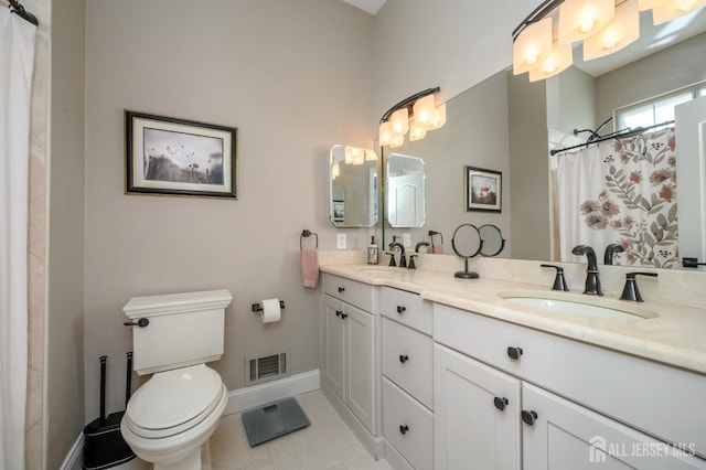 full bathroom featuring visible vents, a sink, baseboards, and toilet