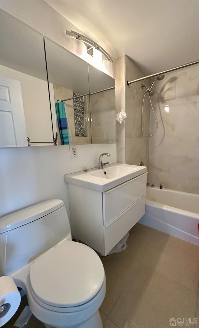 full bathroom featuring tile patterned floors, shower / tub combo with curtain, vanity, and toilet