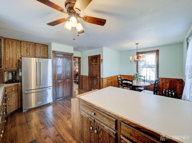 36 Frederick St, Carteret, NJ 07008 - kitchen featuring high end refrigerator, brown cabinetry, wainscoting, a chandelier, and a ceiling fan