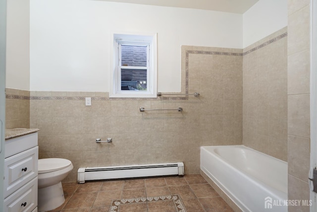360 Alpine St, Perth Amboy, NJ 08861 - bathroom featuring baseboard heating, tile walls, a tub, vanity, and a wainscoted wall