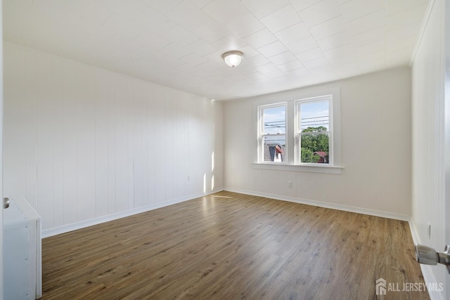 360 Alpine St, Perth Amboy, NJ 08861 - empty room with hardwood / wood-style flooring and baseboards