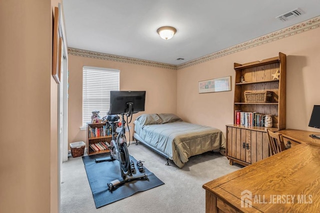 bedroom featuring carpet and visible vents