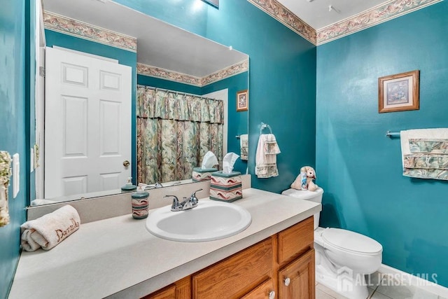 full bathroom with tile patterned flooring, toilet, vanity, and a shower with curtain
