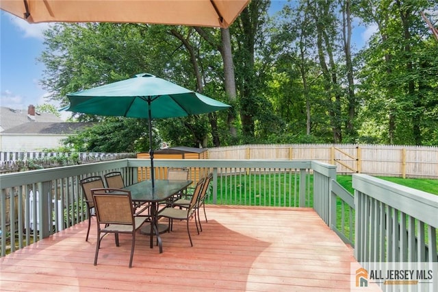 5 Channing Rd, East Brunswick, NJ 08816 - deck featuring a fenced backyard and outdoor dining area