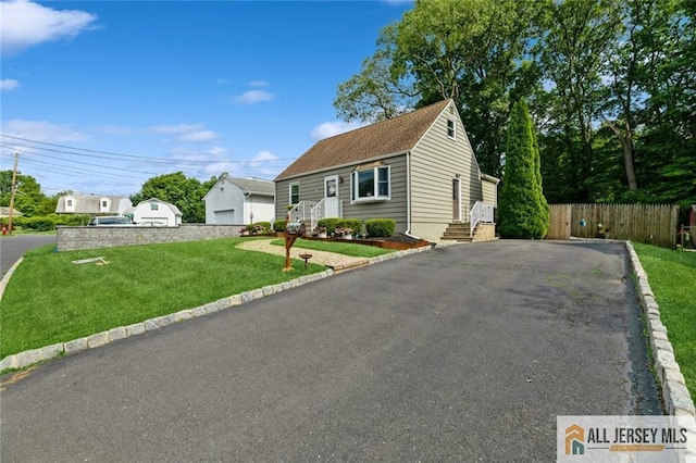 5 Channing Rd, East Brunswick, NJ 08816 - view of front of home with asphalt driveway