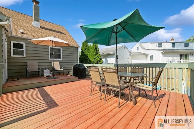 5 Channing Rd, East Brunswick, NJ 08816 - deck with area for grilling and outdoor dining area