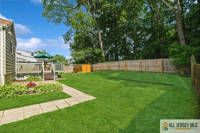 5 Channing Rd, East Brunswick, NJ 08816 - fenced backyard with a wooden deck