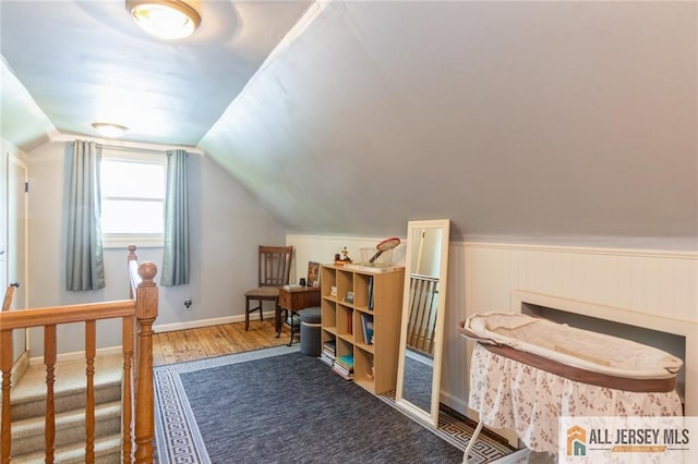 5 Channing Rd, East Brunswick, NJ 08816 - bonus room featuring wood finished floors, vaulted ceiling, and wainscoting