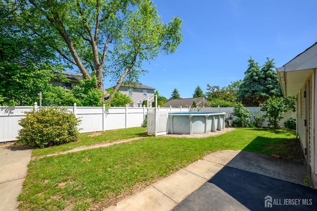 1909 Hamilton Blvd, South Plainfield, NJ 07080 - view of yard with a patio area