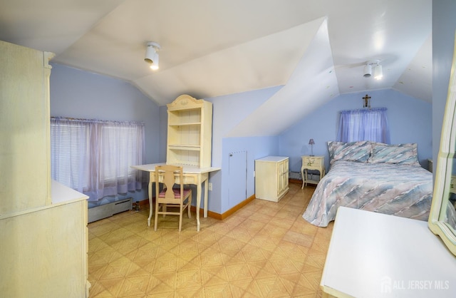 1909 Hamilton Blvd, South Plainfield, NJ 07080 - bedroom featuring vaulted ceiling, light floors, a baseboard heating unit, and baseboards