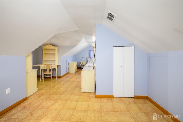 1909 Hamilton Blvd, South Plainfield, NJ 07080 - additional living space with baseboards, lofted ceiling, and light flooring