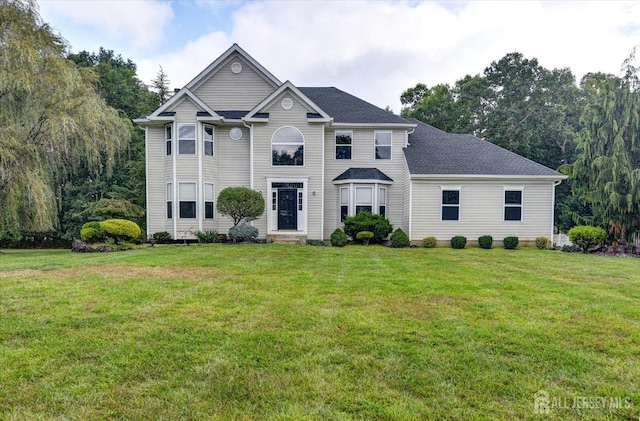 view of front of home with a front yard