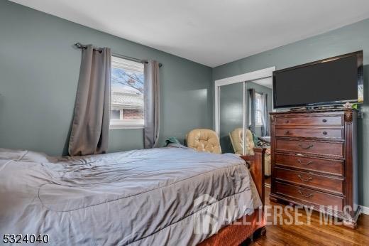 27 6th Ave, Port Reading, NJ 07064 - bedroom with wood finished floors and a closet