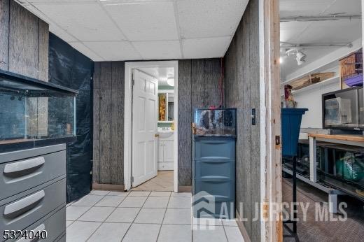 27 6th Ave, Port Reading, NJ 07064 - bathroom with tile patterned flooring and a drop ceiling