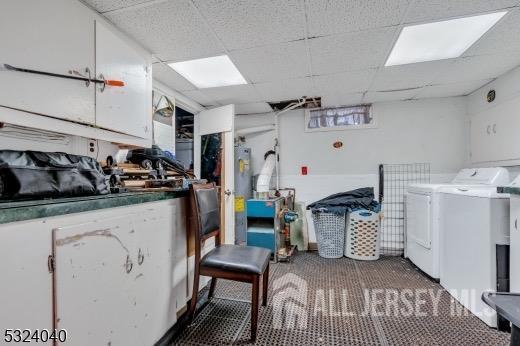 27 6th Ave, Port Reading, NJ 07064 - washroom featuring separate washer and dryer and carpet