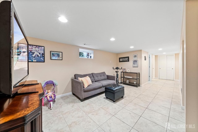 living area with visible vents, recessed lighting, baseboards, and light tile patterned flooring