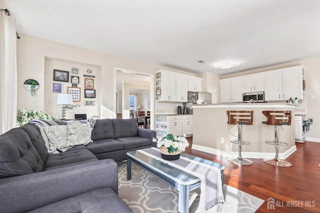 living room featuring dark hardwood / wood-style floors