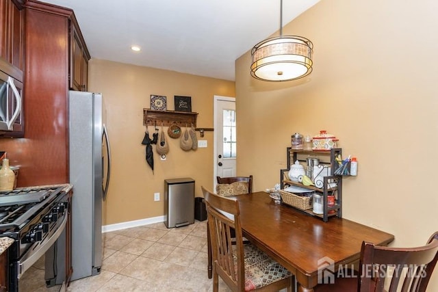 dining room featuring light tile patterned flooring, baseboards, and recessed lighting