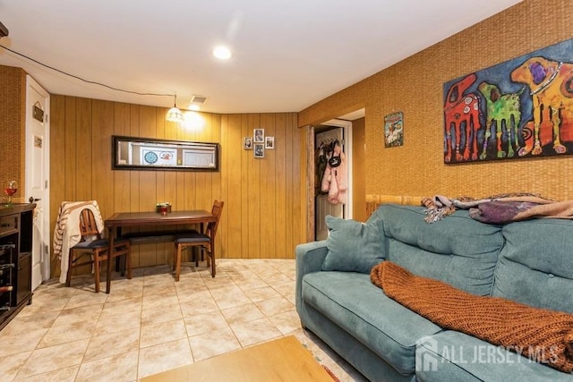 living room with visible vents and tile patterned flooring