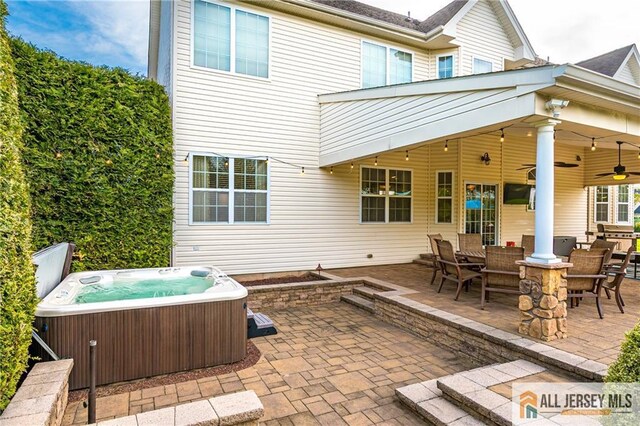 4 Van Gogh Ct, South Brunswick, NJ 08852 - view of patio / terrace with a hot tub, ceiling fan, and outdoor dining space