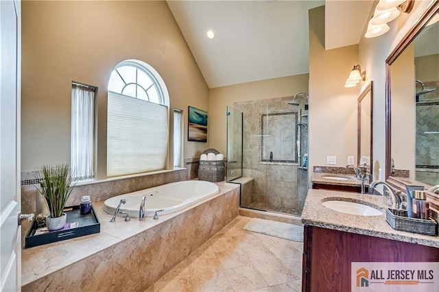 4 Van Gogh Ct, South Brunswick, NJ 08852 - full bath with a stall shower, a bath, double vanity, and lofted ceiling