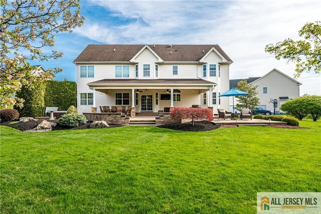 4 Van Gogh Ct, South Brunswick, NJ 08852 - back of property with a patio, ceiling fan, a lawn, and an outdoor living space