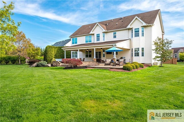 4 Van Gogh Ct, South Brunswick, NJ 08852 - rear view of house featuring a ceiling fan, a patio area, a lawn, and an outdoor hangout area