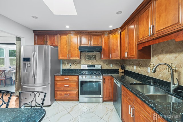 1099 New Dover Rd, Edison, NJ 08820 - kitchen featuring appliances with stainless steel finishes, extractor fan, dark stone counters, a skylight, and tasteful backsplash