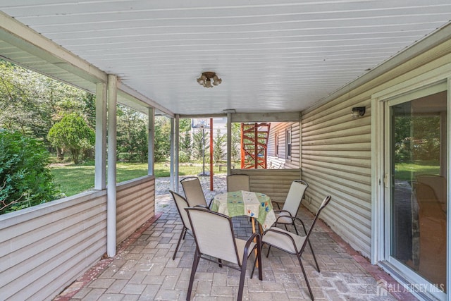 1099 New Dover Rd, Edison, NJ 08820 - sunroom / solarium with outdoor dining area and healthy amount of natural light
