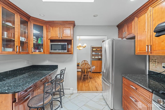 1099 New Dover Rd, Edison, NJ 08820 - kitchen with stainless steel appliances, light marble finish floors, dark stone counters, glass insert cabinets, and recessed lighting