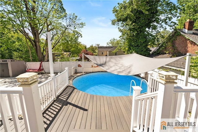 15 Kensington Ave, Trenton, NJ 08618 - view of swimming pool with a fenced backyard and a deck