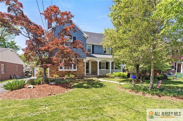 15 Kensington Ave, Trenton, NJ 08618 - view of front of house featuring a porch and a front lawn