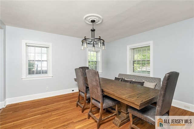 15 Kensington Ave, Trenton, NJ 08618 - dining room featuring light wood-style flooring and a chandelier