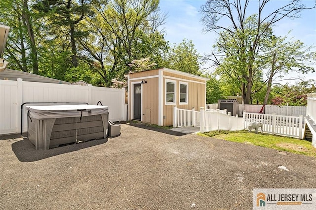 15 Kensington Ave, Trenton, NJ 08618 - view of outdoor structure with a hot tub and a fenced backyard
