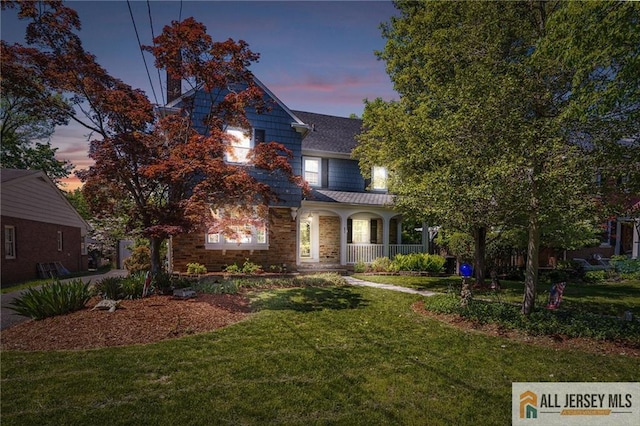 15 Kensington Ave, Trenton, NJ 08618 - view of front of property with a porch and a lawn