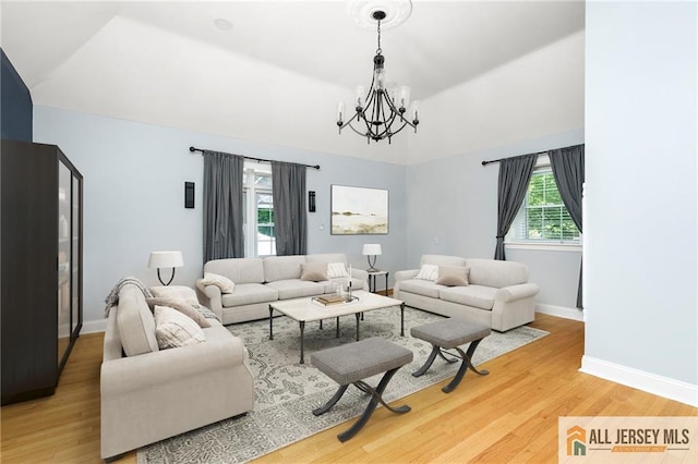 15 Kensington Ave, Trenton, NJ 08618 - living room featuring a chandelier, light wood finished floors, and lofted ceiling