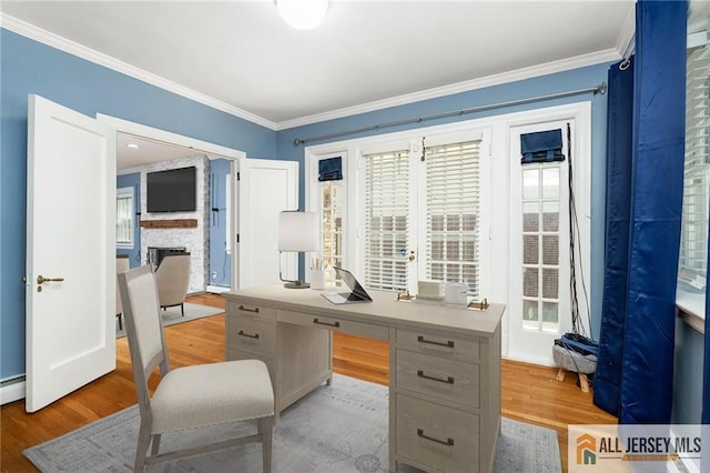 15 Kensington Ave, Trenton, NJ 08618 - office with ornamental molding, light wood-style flooring, healthy amount of natural light, a fireplace, and baseboard heating