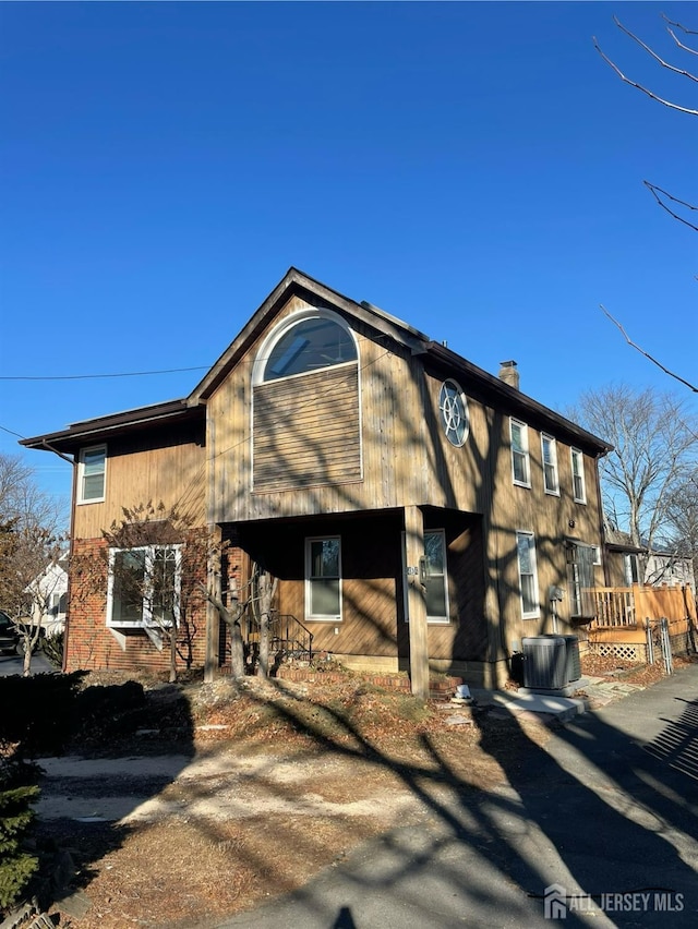 view of front of property featuring a chimney