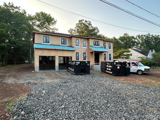 21 Williams Rd, Edison, NJ 08820 - view of front of property featuring an attached garage and driveway