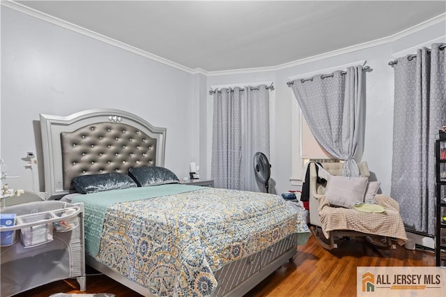 435 Ashley St, Perth Amboy, NJ 08861 - bedroom featuring crown molding and wood finished floors